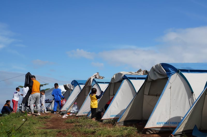 Setting up a tarp for weather protection
